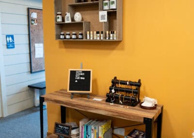 Organized shelf with wellness products at Bright Futures Chiropractic clinic.